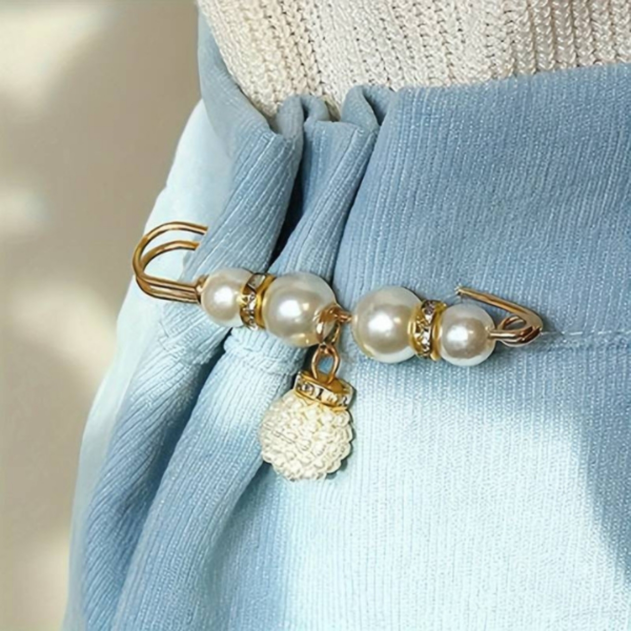Look elegante a forma di perla.