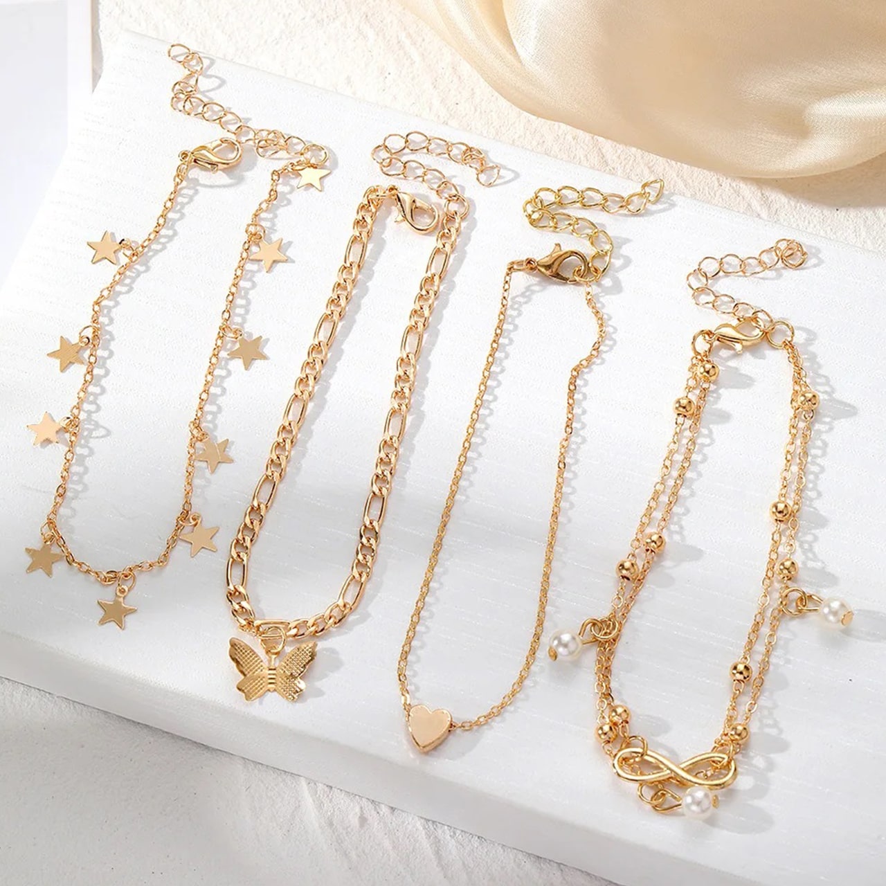SummerSet, set di 4 braccialetti per caviglia